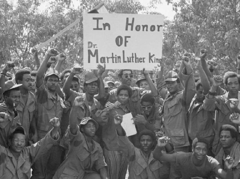 African American soldiers hold up the “Black Power” fist following the death of Reverend Dr. Martin Luther King, Jr.; 1968. (Bettman Archive)