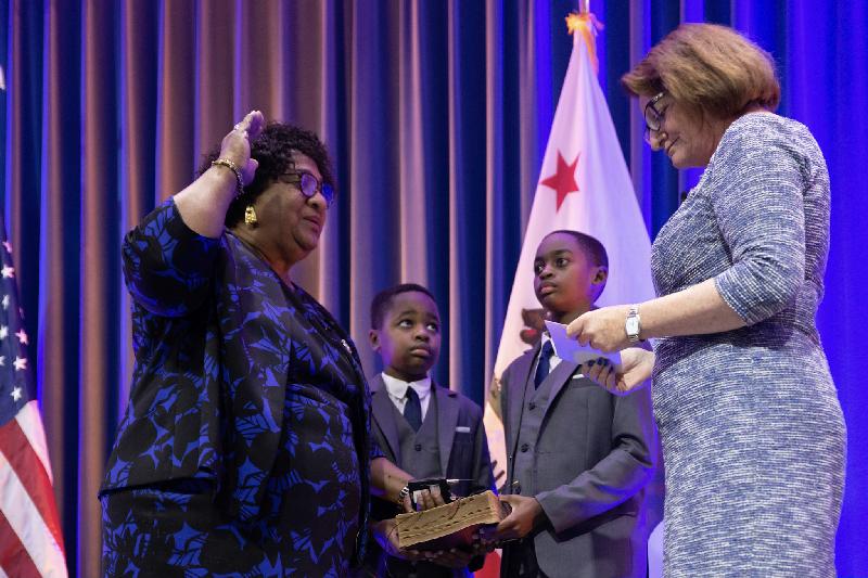 Dr Shirley Weber being sworn in by CA State Senate pro tem pore Toni Atlkins as grandsons watch - Robert Maryland -California Balck Media