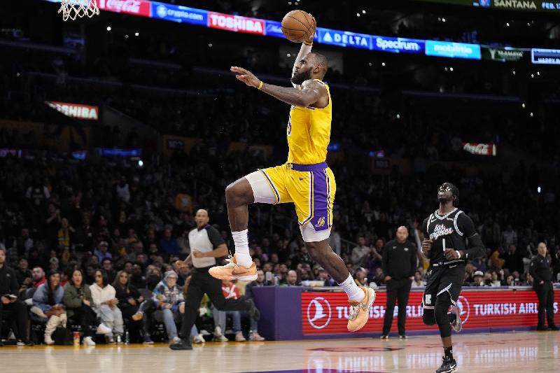 LeBron James airborne (Mark J Terrill-AP) 