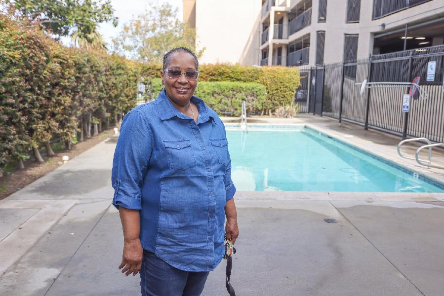 Doris Ealy by the pool via FHLBSF