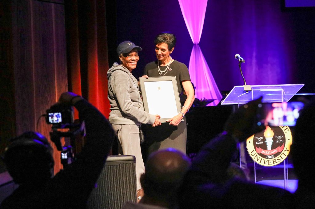 President of Bowie State University Dr. Aminta H. Breaux presents Dionne Warwick