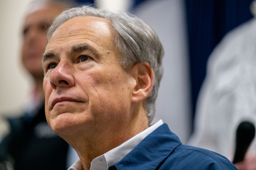 Texas Gov. Greg Abbott listens to reporters