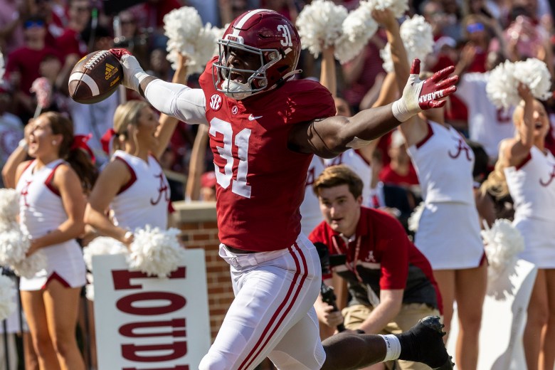 Alabama linebacker Will Anderson Jr. (31) runs back an interception for a touchdown against Louisiana-Monroe during the first half of an NCAA college football game