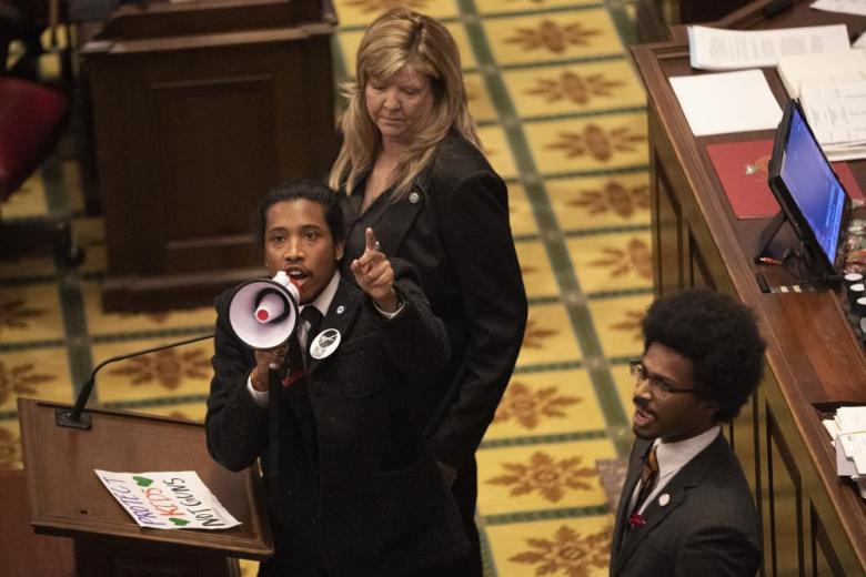 Tennessee State Representative Justin Jones calls on his colleagues to pass gun control legislation from the well of the House Chambers during the legislative session at the State Capitol Thursday, March 30, 2023 in Nashville, Tenn.