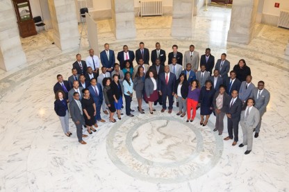 Former SBLSC Board Members Don Bell and Adrian Swann join other Senate staffers for a photo. Image: courtesy of SBLSC