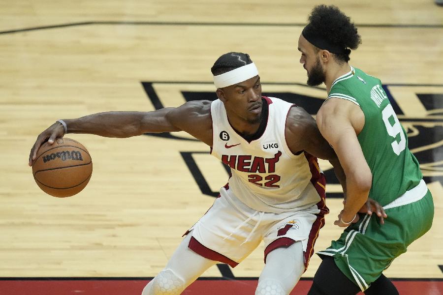 Jimmy Butler and Derrick White (Rebecca Blackwell-AP) 