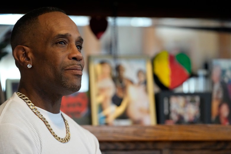 Damone Presley sits next to a memorial area in his house for his daughter, Nitosha