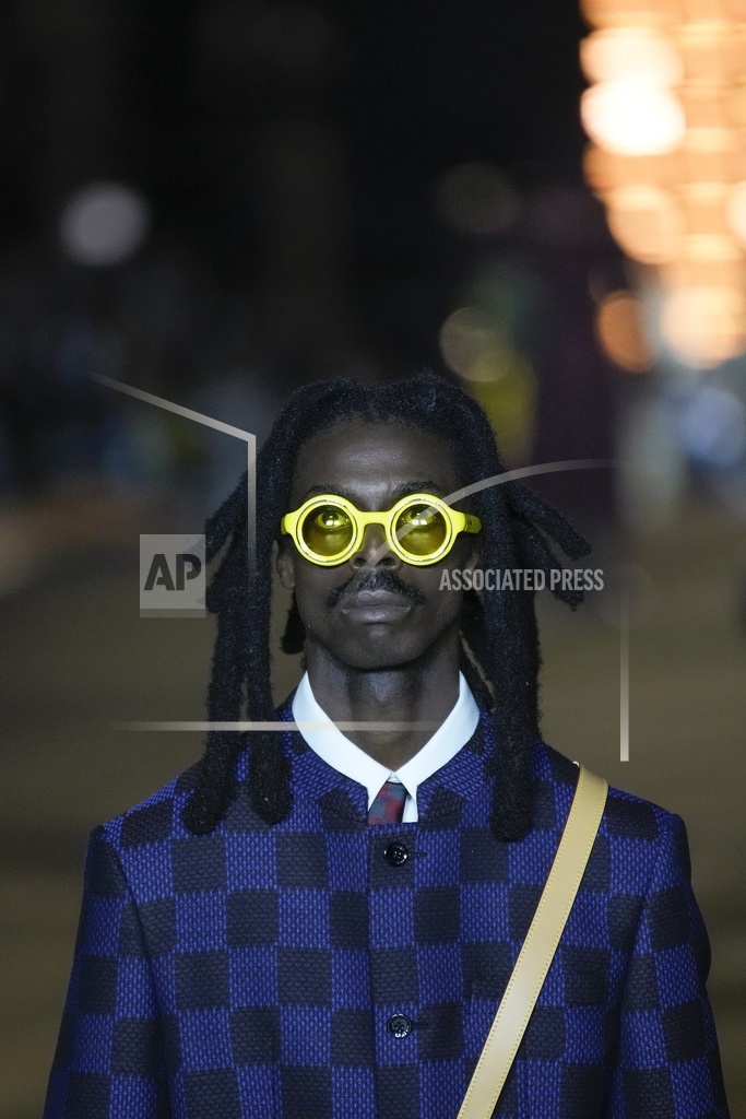 Models wear creations for Louis Vuitton