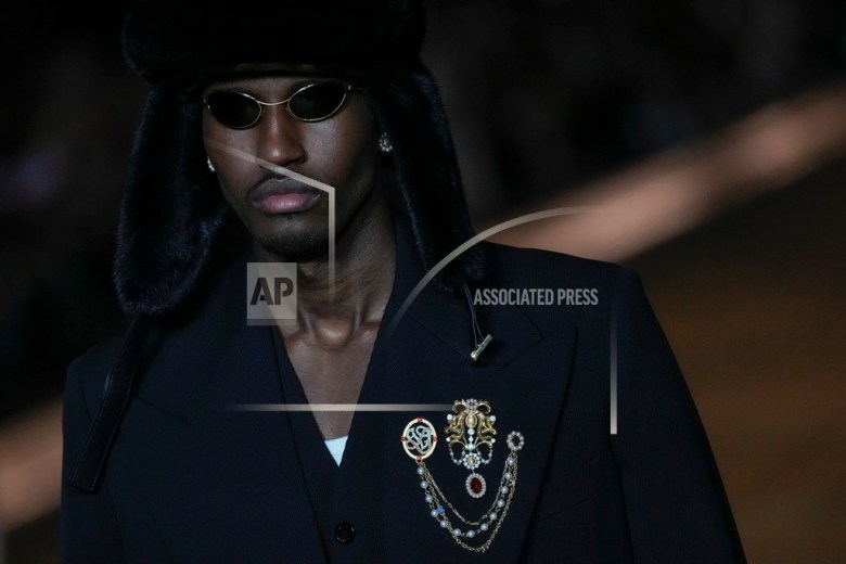 Models wear creations for Louis Vuitton