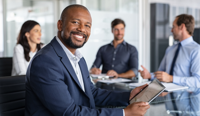 Black business man smiling 