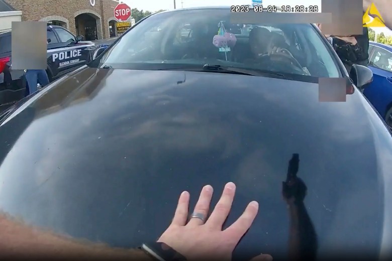 This still image from bodycam video released by the Blendon Township Police.