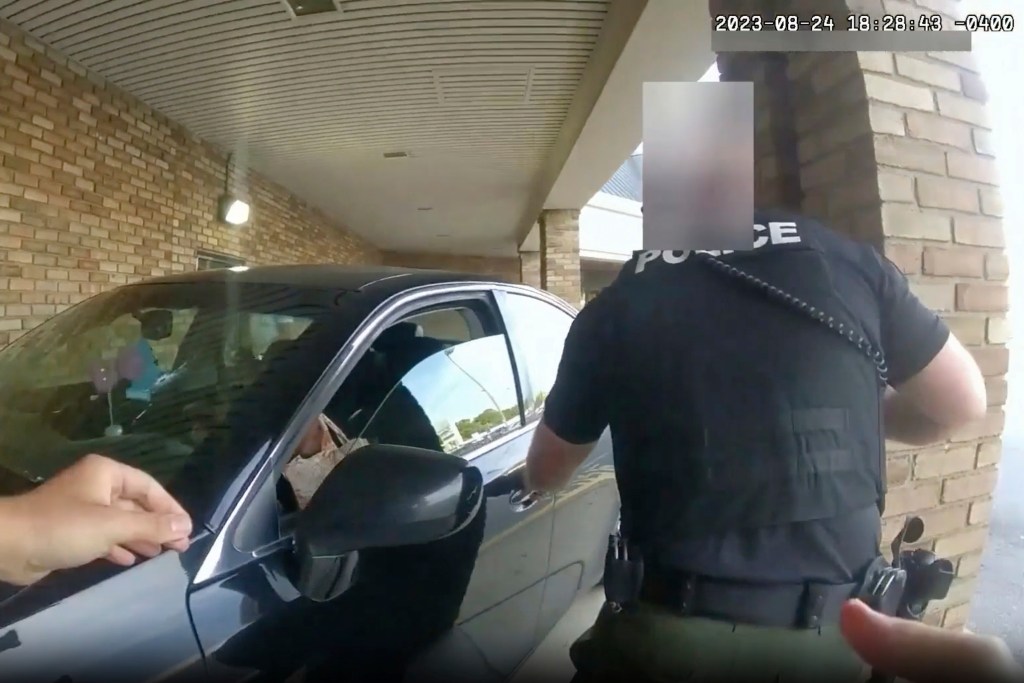 This still image from bodycam video released by the Blendon Township Police.