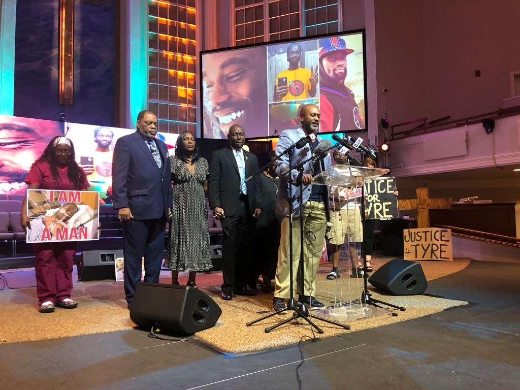 Tyre Nichols' stepfather Rodney Wells, second left, and Nichols' mother RowVaughn Wells, third left, close their eyes in prayer before a news conference about federal charges filed against five former officers in Nichols' death on Tuesday, Sept. 12, 2023, in Memphis, Tenn.