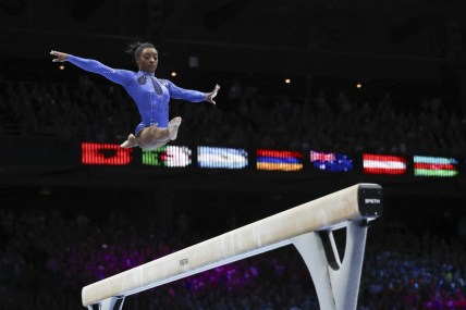 Simone Biles wins 6th all-around title at worlds to become most decorated gymnast in history