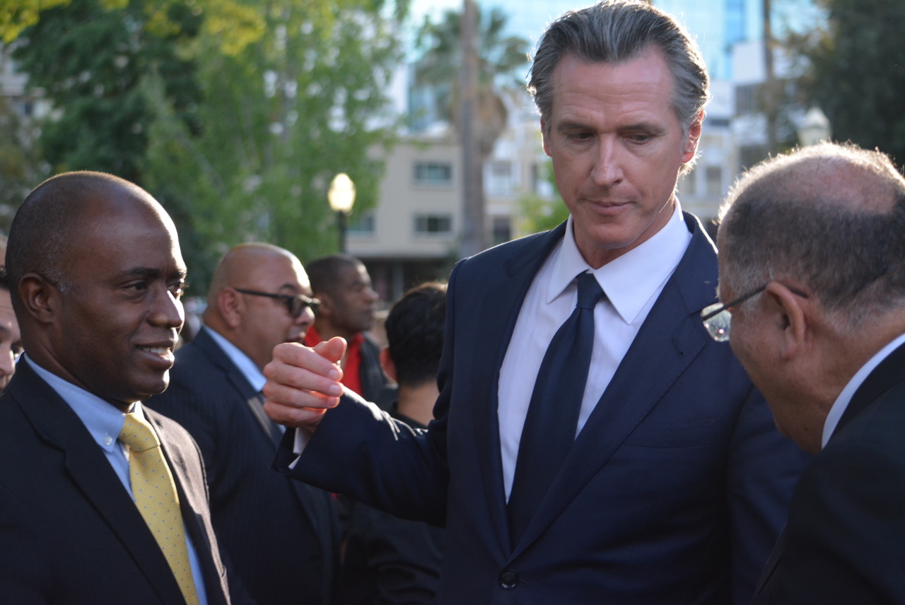 Gov. Gavin Newsom, right, with State Superintendent for Public Instruction Tony Thurmond, left. Newsom was the featured speaker at the California Firefighters Memorial Ceremony. 14, 2023. CBM Photo by Antonio Ray Harvey. 