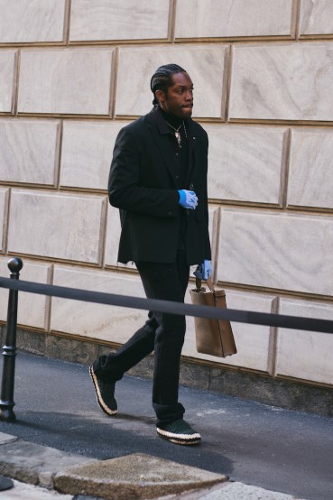 MILAN, ITALY - JANUARY 15: A guest wears black blazer outside Giorgio Armani show  during the Milan Fashion Week - Menswear Fall/Winter 2024-2025 on January 15, 2024 in Milan, Italy. (Photo by Ferda Demir/Getty Images)