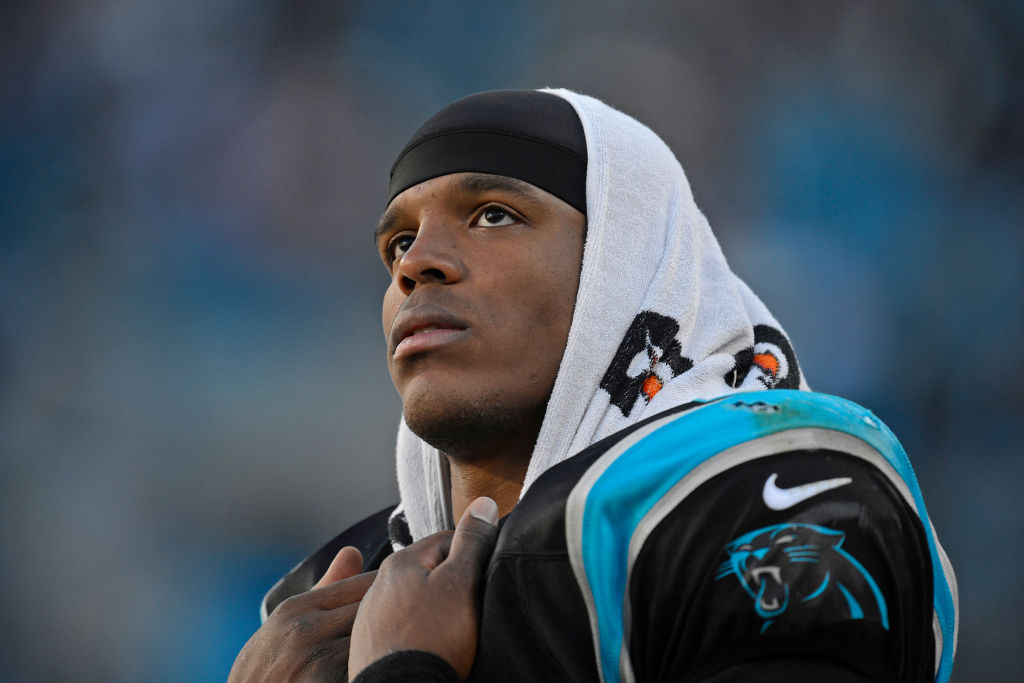 Carolina Panthers starting quarterback Cam Newton (1) stands dejected as the final minutes wind down while playing against the San Francisco 49ers in the fourth quarter of their NFC divisional playoff NFL game at Bank of America Stadium in Charlotte, N.C.