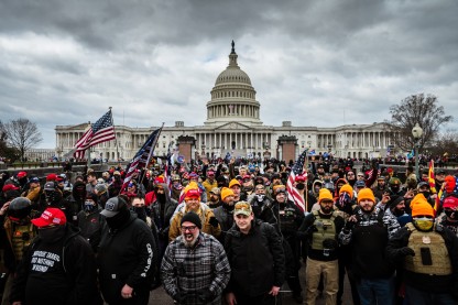 Jarring images from the January 6th insurrection in 2021. Image: Jon Cherry/Getty Images.