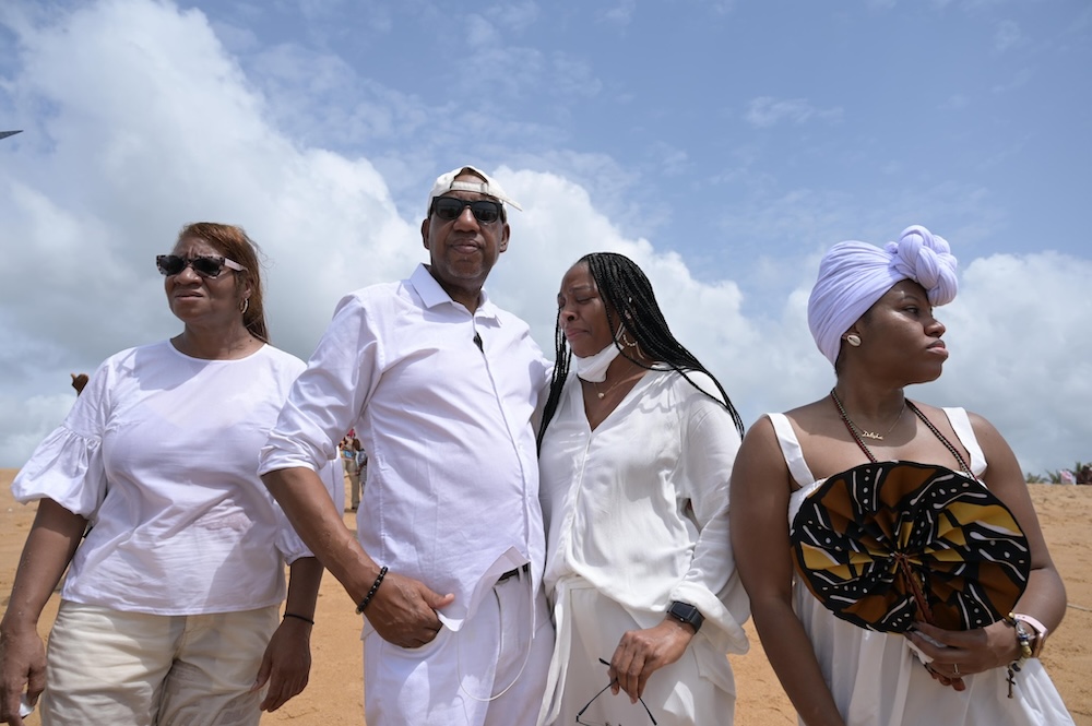 Clotilda descendants, Cassandra Lewis, Garry Lumbers, Altevese Rosario and Delisha Marshall stand on Ouidah Beach, where their ancestors touched African soil for the last time in 1860. Image: National Geographic/Etinosa Yvonn