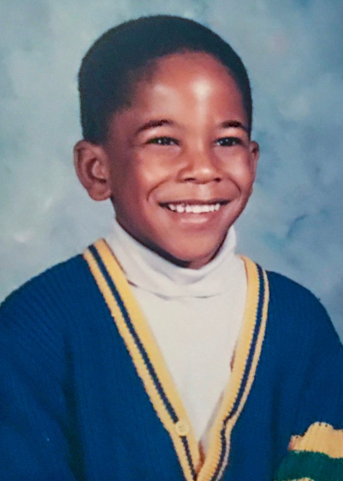 Dex Robinson at 5 years old, smiling for his kindergarten school photo