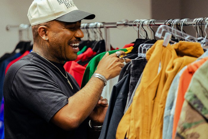 Dex Robinson sorts through wardrobe collection for model fittings