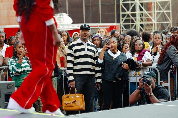 Dex Robinson watches the fashion show from the pit at VUU