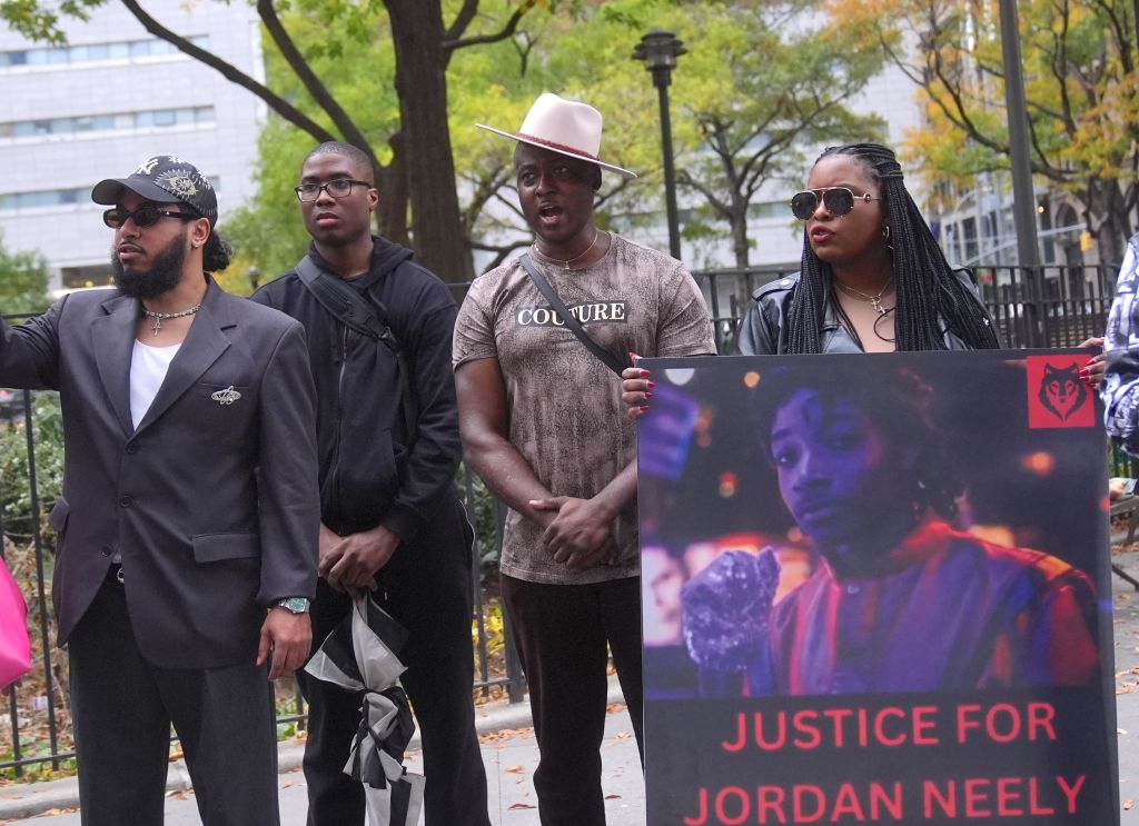 Demonstrators protest ahead of opening statements in subway chokehold trial